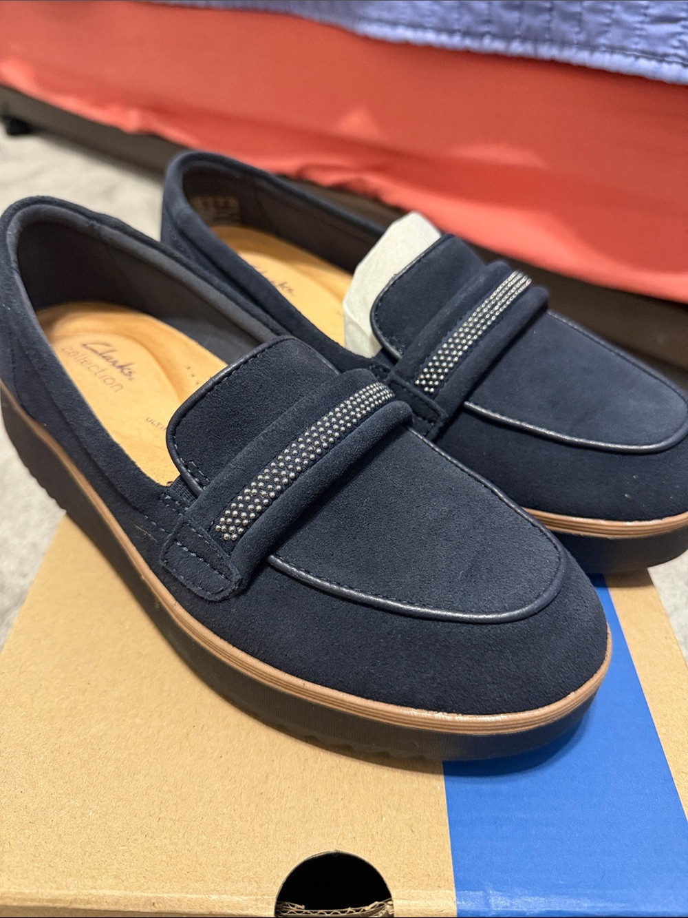 Clarks Navy Suede Slip-On Loafers with Studded Strap Accent